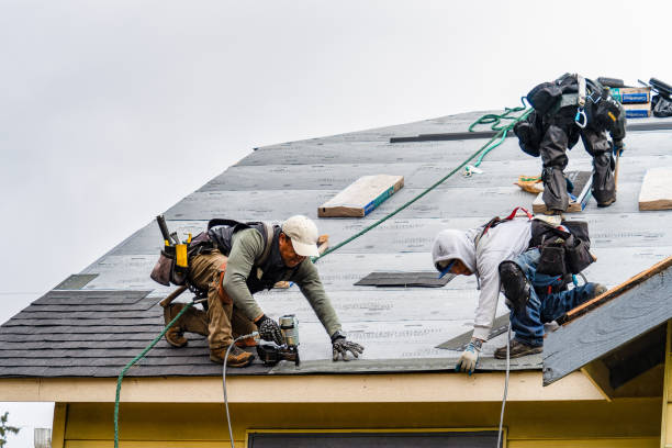 Professional Roofing technician working in Easton, CT